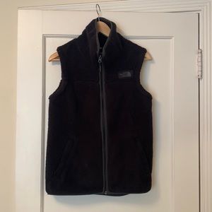 The Northface women’s black fleece vest
